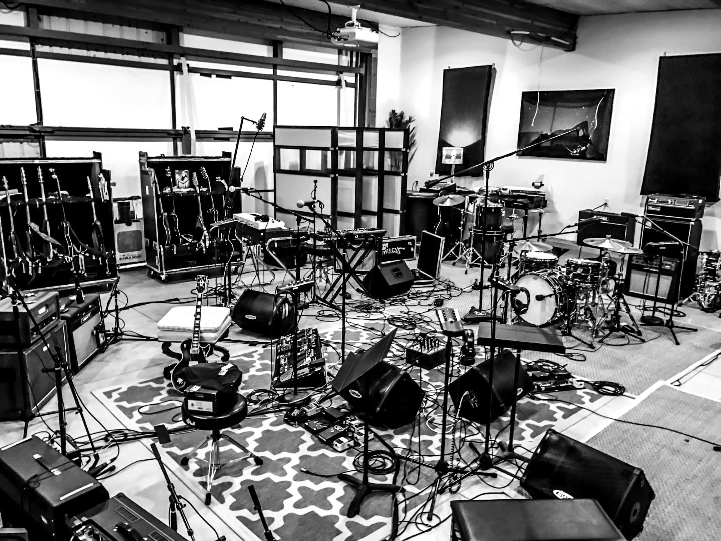 Arctic Monkeys set up for tour rehearsal in Studio One at ESCAPE — full backline staged in the desert