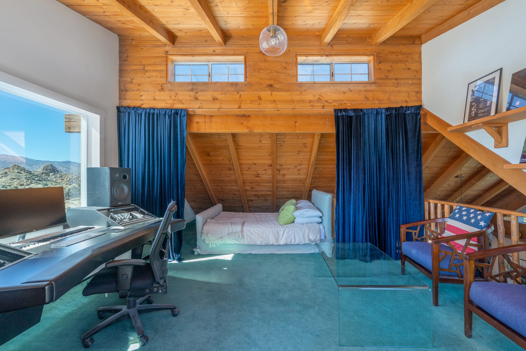 The Songwriting Suite at ESCAPE — day bed under the cathedral ceiling
