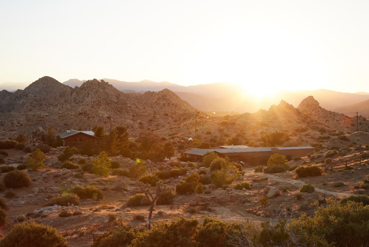 ESCAPE at sunset — the compound across 140 acres of high desert